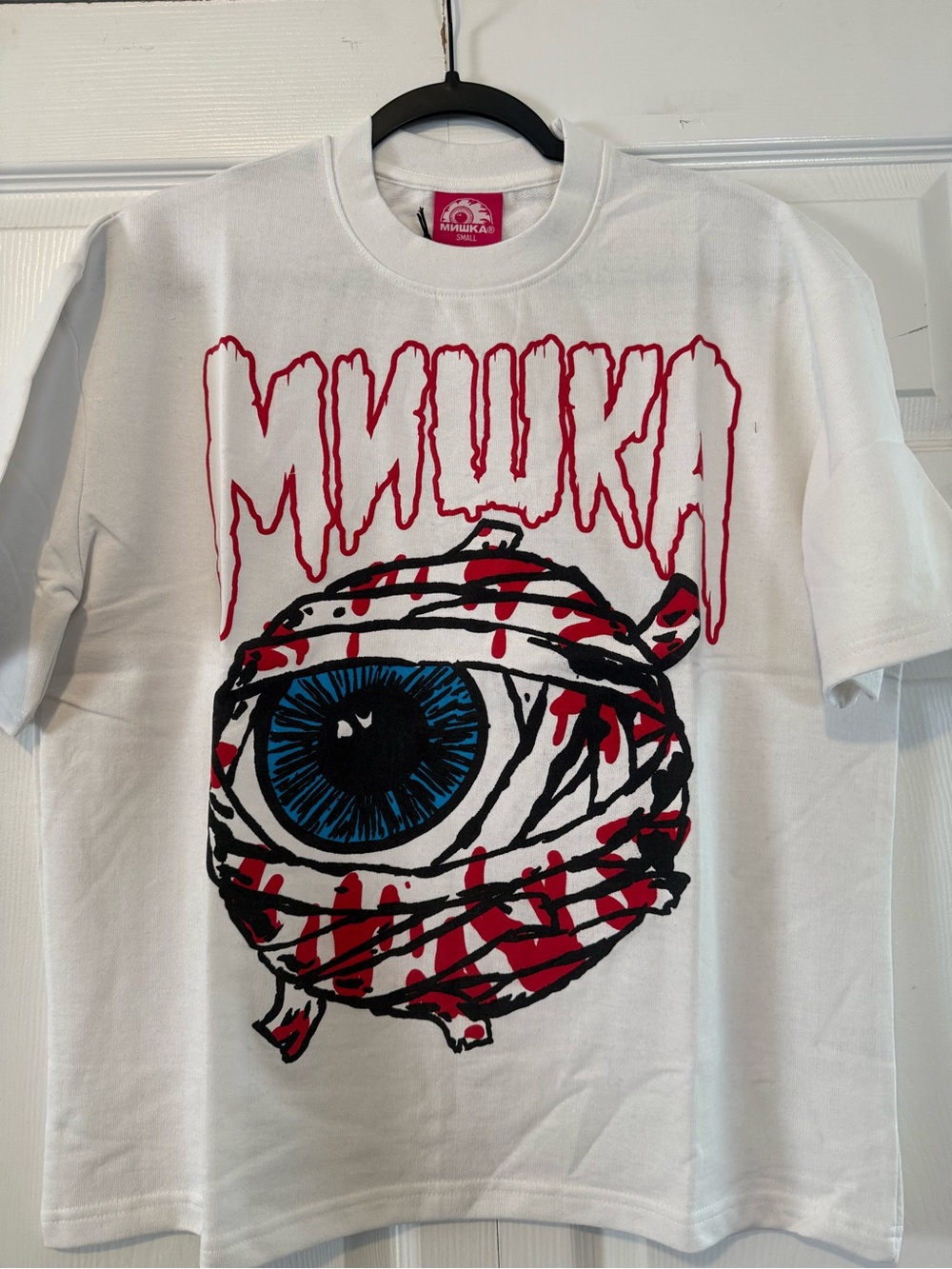 Mishka White Tee with Blue Eyeball and Red Graphic